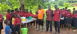 Project director tasting soobolo prepared by the caterers